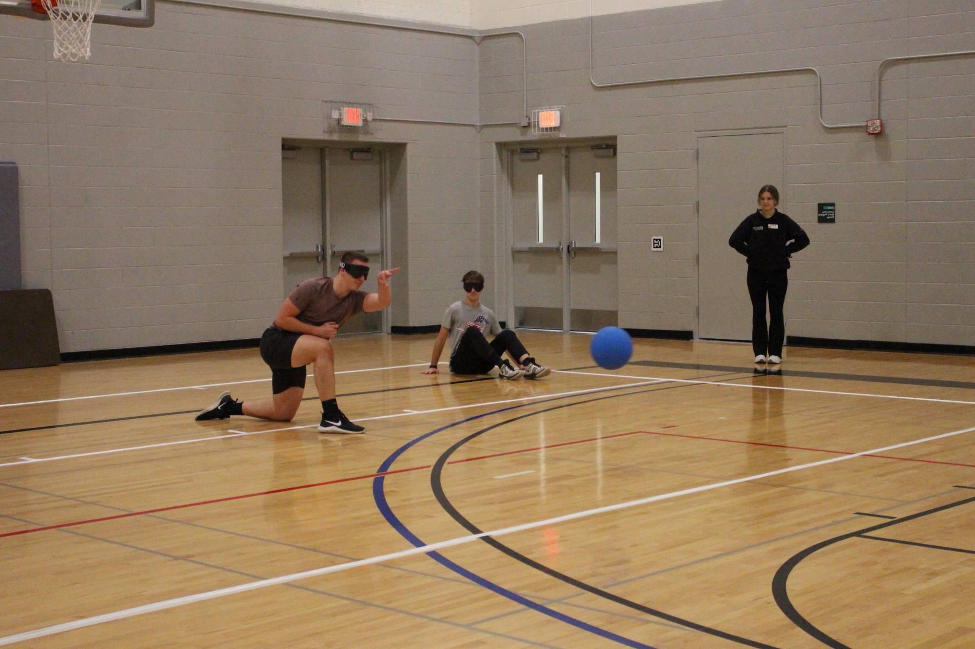Student playing goalball at an adaptive intramural sports event